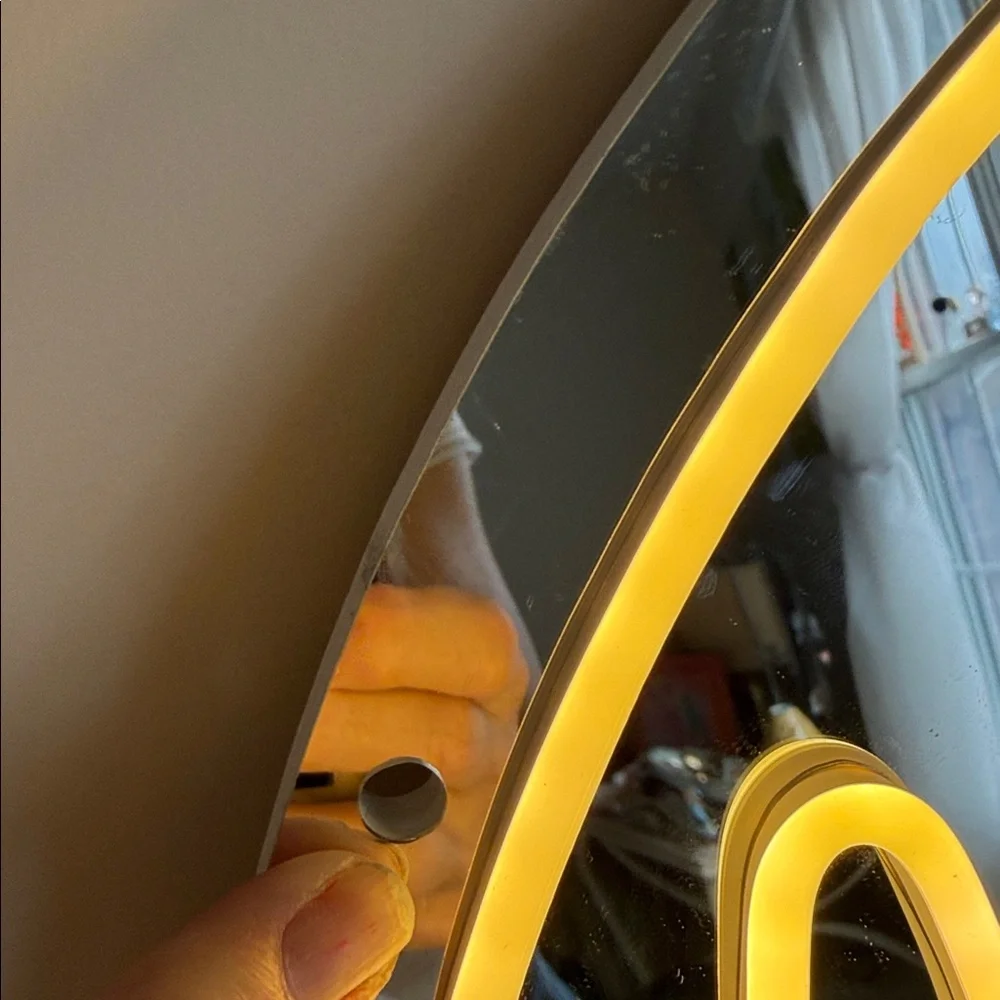 Contemporary White Arch Wall Mirror with Leaf Accent